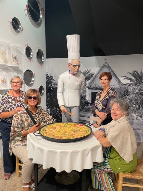 Erasmus seniors admiring a paella scenography during their visit to the Ethnographic Museum of Valencia.